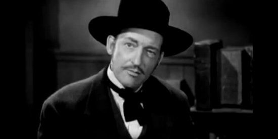 Warren William as Harry Farrel, determined to control the Powder River Valley in Wild Bill Hickok Rides (1942)