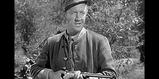 Addison Richards as Dave Kincaid, finding a stranger trying to steal his horse in Wyoming (1940)