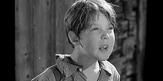 Bobs Watson as JImmy Kincaid, the young boy who adopts Reb Harkness as his uncle in Wyoming (1940)