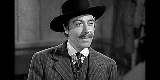 Joseph Calleia as John Buckley, the man who wants to turn Sweet Water Valley into his personal cattle empire in Wyoming (1940)