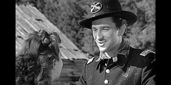 Lee Bowman as Lt. Connally, the cavalry officer who falls for pretty Lucy Kincaid in Wyoming (1940)