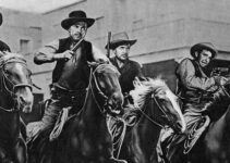 The Dalton boys -- Noah Beery Jr. as Ben, Kent Taylor as Bob, Alan Curtis as Emmett and Lon Chaney Jr. as Grat -- charge through Skeleton Creek in The Daltons Ride Again (1945)