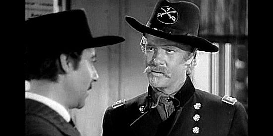 Paul Kelley as George Custer, questioning Buckley about missing rifles in Wyoming (1940)