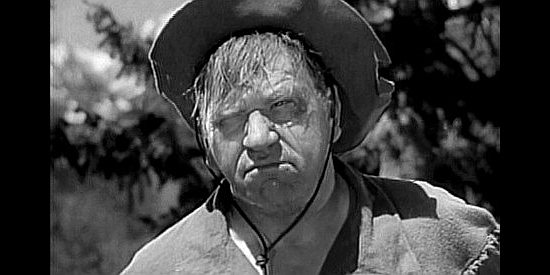 Wallace Beery as Reb Harkness, catching up with killers and feeling ornery in Wyoming (1940)