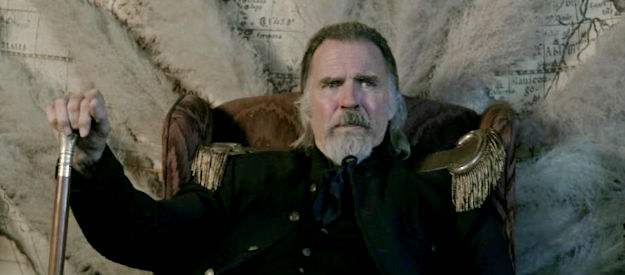 Jeff Fahey as Gen. Bork, owner of a traveling business offering gambling, booze and girls in Guns of Redemption (2025)