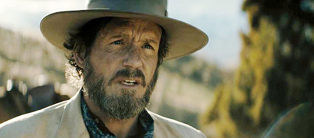 Josh Hopkins as Sheriff Wood Helm, the man sent to bring in Harland Rust and his grandson in Rust (2024)