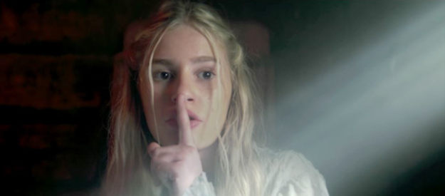 Kaitlyn Kemp as Charlotte, cautioning her sister to stay quiet as they hide from Gen. Bork's men in Guns of Redemption (2025)