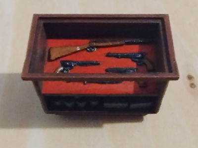 My favorite part of the CreeyHero store set, a display case for pistols, a rifle and a knife