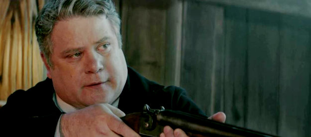 Sean Astin as Parson Dyer, defending his church against Gen. Bork and his men in Guns of Redemption (2025)