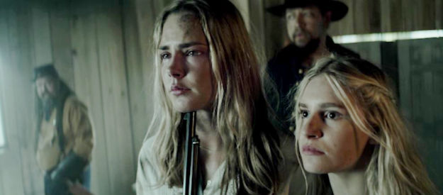 Siena Bjornerud as Anna and Kaitlyn Kemp as Charlotte, young girls with a problem named Gen. Bork in Guns of Redemption (2025)