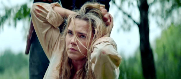 Siena Bjornerud as Anna, finding herself in the clutches of Gen. Bork's men again in Guns of Redemption (2025)
