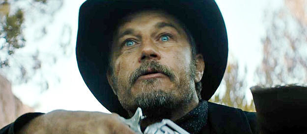 Travis Fimmel as Fenton 'Preacher' Lang, determined to get the $1,000 bounty on Harland Rust's head in Rust (2024)