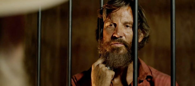 Chris Cleveland as Mack Goode, Joe's cousin, defiant even behind bars in Blood in Them Hills (2025)