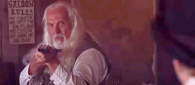 Corbett Hall as the Brazos bartender who guns down card cheats in Showdown on the Brazos (2025)