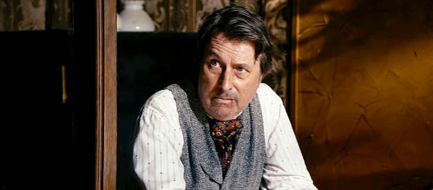 Curt Lambert as the banker, fretting over what will happen if the $30,000 isn't recovered in The Company of Thieves (2025)