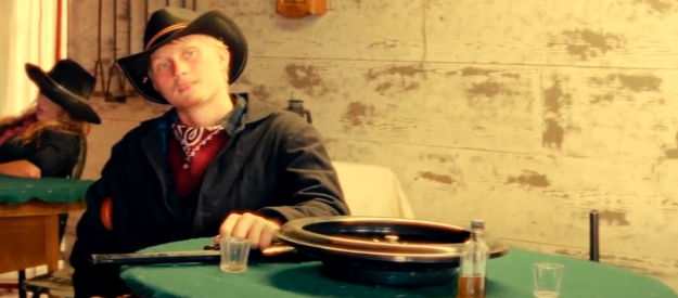 Daniel Douglas as Billy Boggs, one of the bounty men who answer the sheriff's call for help in Death After Dusk (2024)