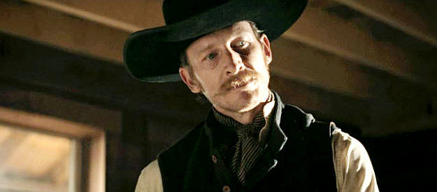 James Landry Herbert as Zeke, one of Col. Davis's henchmen in Trail of Vengeance (2025)