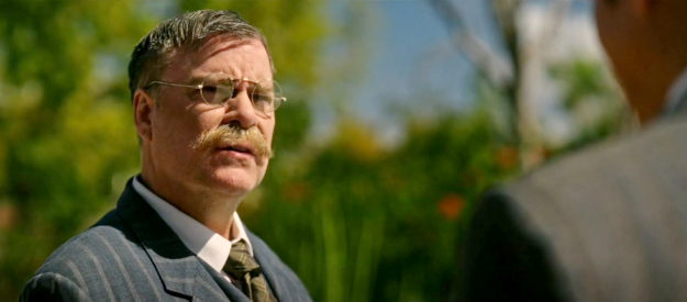 Lee Dawson as President Teddy Roosevelt, learning fo special visitors arriving in the United States in The Wide West (2025)