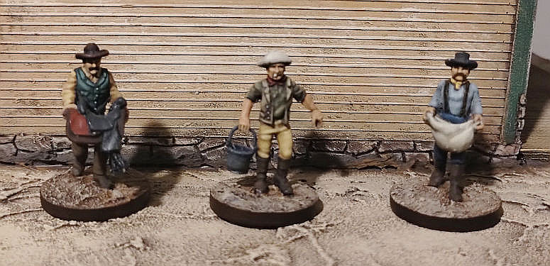 One of the great things about the Gunfighter's Ball range is that it includes more than gunfighters. Here are three of the six figures from the Laborers faction pack