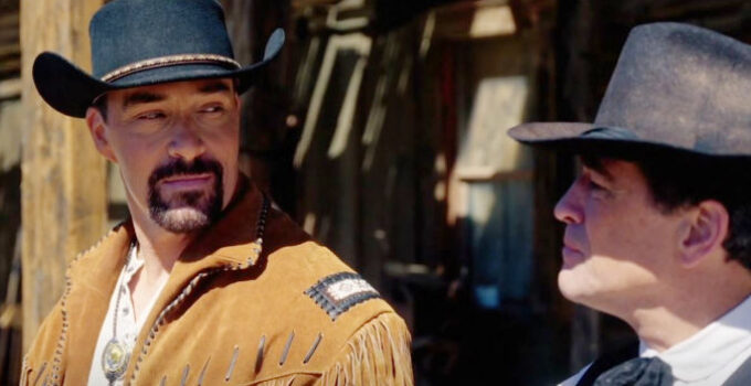 Alexander Nevsky as Max and Nick Baillie as Judge Ogburn, ready to work together to save Goldwood in The Wide West (2025)