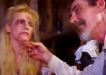 Brent Rock as gang leader Nate Jones with one of his victims in Showdown on the Brazos (2025)