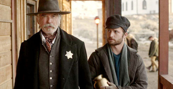 Pierce Brosnan as Sheriff Gabriel Dove with Brandon Lessard as Henry Broadway in The Unholy Trinity (2024)