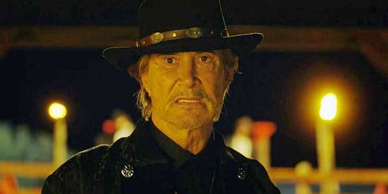 Richard Norton as Damien SInclair, the man behind all the killings and land grabbing in Black Creek (2024)