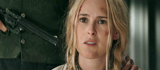 Rumer Willis as Katherine Atherton, looking for answers after the death of her husband, even at the point of a gun in Trail of Vengeance (2025)