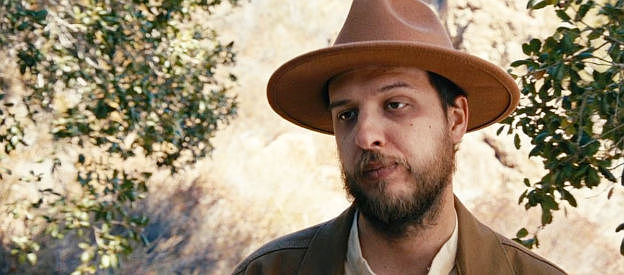 Ryan Bush as the Carson City sheriff, unimpressed that the Marshal's preferred tracker is a young Indian woman in The Company of Thieves (2025)