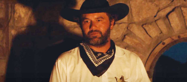 Sammy Wilson as Sheriff William Cooper, hoping others will stop the killer terrorizing his down in Death After Dusk (2024)