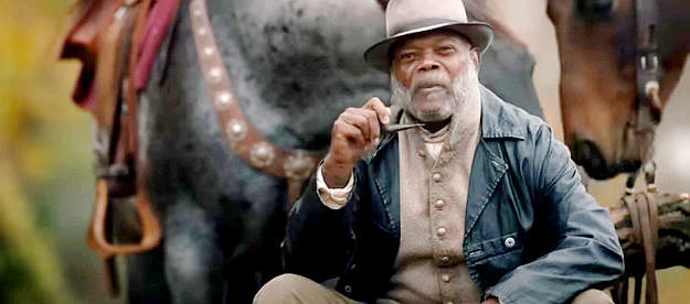 Samuel L. Jackson as St. Christopher, searching for his share of stolen gold in The Unholy Trinity (2024)