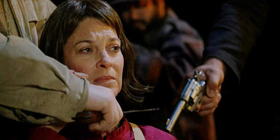 Tracy Melchior as Elizabeth Jennings, the sheriff's wife, in the hands of Sinclair's men in Black Creek (2024)
