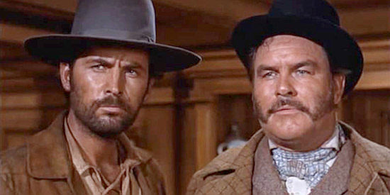 Fess Parker as Davy Crockett and Jeff York as Mike King, ready to set a trap for the pirates in Davy Crockett and the River Pirates (1956)