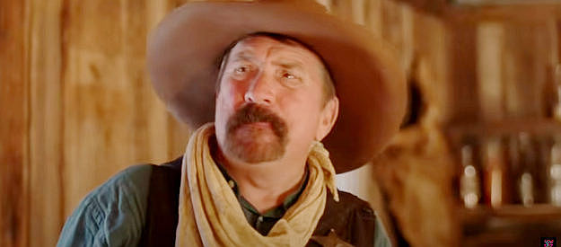 Andy Andersen as Sheriff Rogers, skeptical of Reynolds' tale of aliens and time travel in Andromeda 1883 (2024)