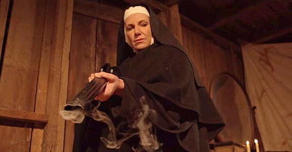 Charlotte Crumm as Sister Martha, proving that yes, she knows how to use a shotgun in Demon's Vale (2024)