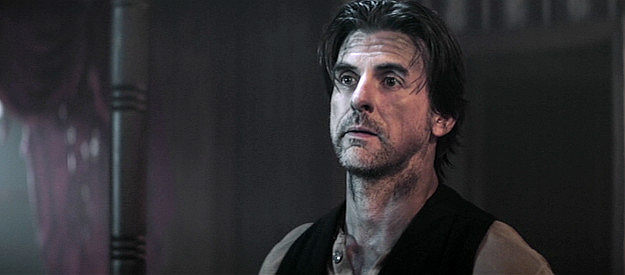 Cooper Barnes as Levi, encouraging the residents of Redemption to fight alongside Thomas in Gunslingers (2025)