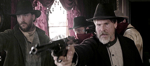 Dan O'Brien as Josh and William McNamara as Kelly, determined to collect the bounty on Thomas Keller in Gunslingers (2025)