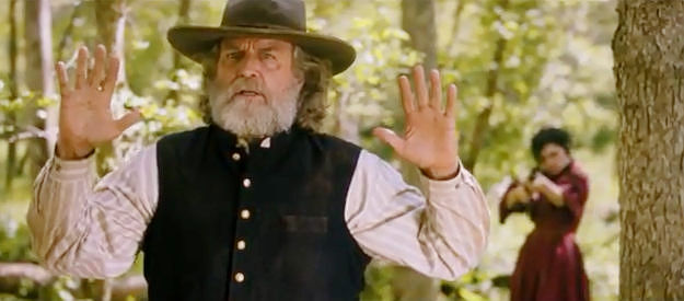 Darby Hinton as Malcolm Hunter, meeting up with shotgun wielding Ginny (Julie Kashmanian) in Was Once a Hero (2024)