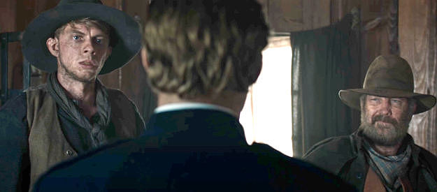 Harry Greenwood as John McPharlen and Anthony Cogin as Robert Parsons, friends of Molly Johnson's husband in The Legend of Molly Johnson (2021)