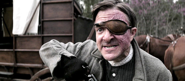 Jeremy Kent Jackson as Robert Keller, revealing a secret to his brother in Gunslingers (2025)