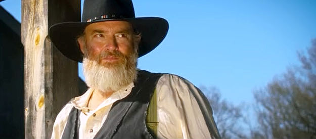 John Carter Cash as Chance, an outlaw leader spying a potential victim in Was Once a Hero (2024)