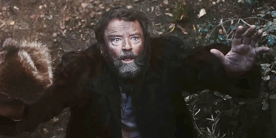 Kevin Karrick as the Trapper who helps rob Link Maddock in Bury 'Em Deep (2025)