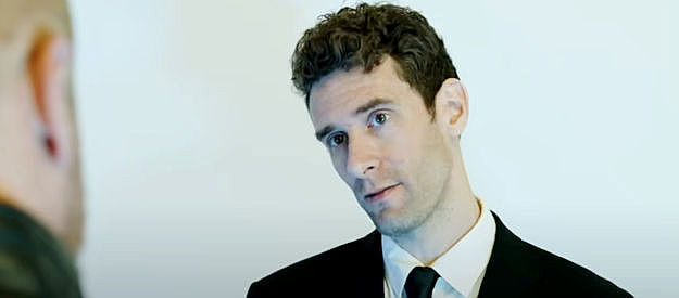 Michael Dooley as Robert McGrady, explaining the mission to Reynolds in Andromeda 1883 (2024)