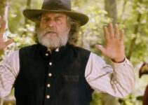 Darby Hinton as Malcolm Hunter, meeting up with shotgun wielding Ginny (Julie Kashmanian) in Was Once a Hero (2024)