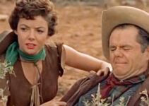 Sheila Connolly (aka Kelly Ryan) as Kat Dalton, helping a wounded Tulsa Cook (Elisha Cook Jr.) in The Outlaw's Daughter (1954)