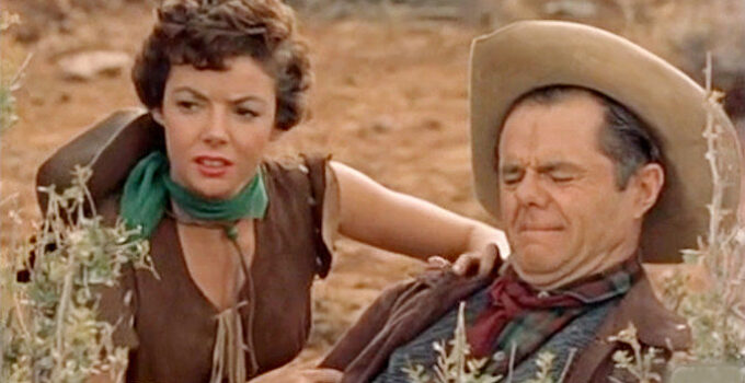 Sheila Connolly (aka Kelly Ryan) as Kat Dalton, helping a wounded Tulsa Cook (Elisha Cook Jr.) in The Outlaw's Daughter (1954)