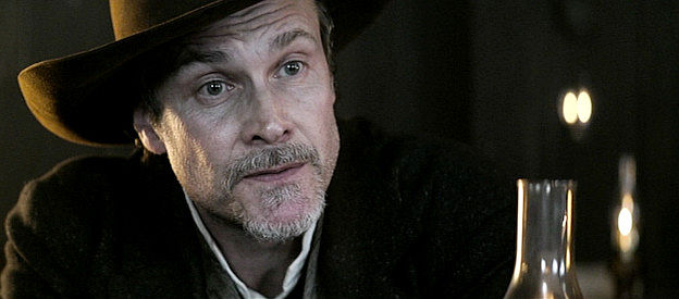 Randall Batinkoff as Doc, wondering why Redemption should take in Thomas Keller in Gunslingers (2025)