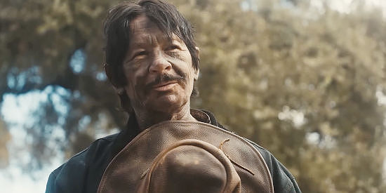 Robert Bronzi as Link Maddock, getting help in his pursuit of four thieves in Bury 'Em Deep (2025)