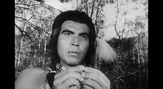 Ned Romero as the Cheyenne warrior, studing the white woman's picture in a locket in The Talisman (1966)