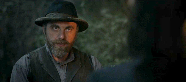 Aharon Jinjihashvili as Arkasha, the Russian who sells his guns to Constance Van Ness rather than a Mexican bandit in The Abandons (2025)